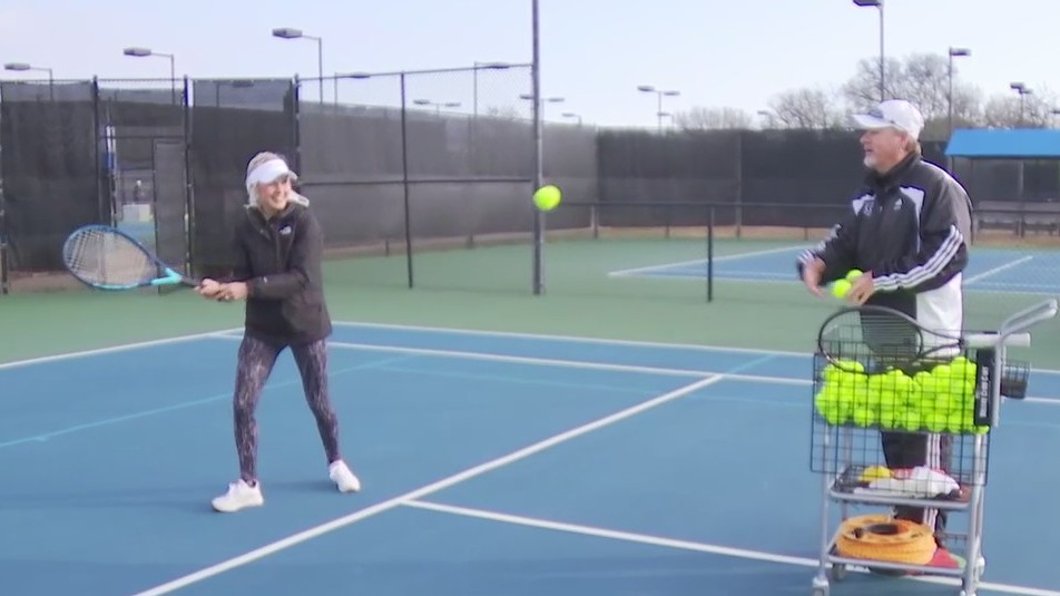 Getting tennis lessons at Grey Rock Tennis Club